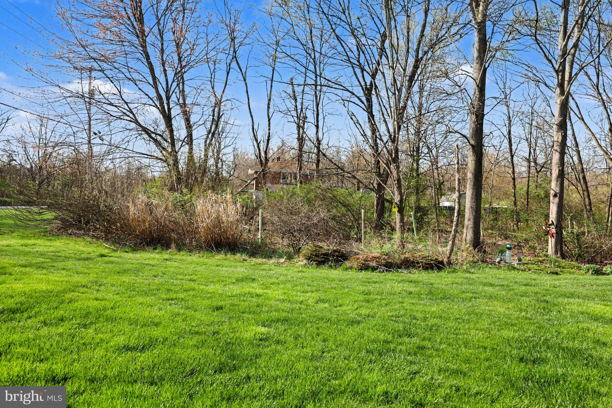 6401 WHISPER WOOD LANE