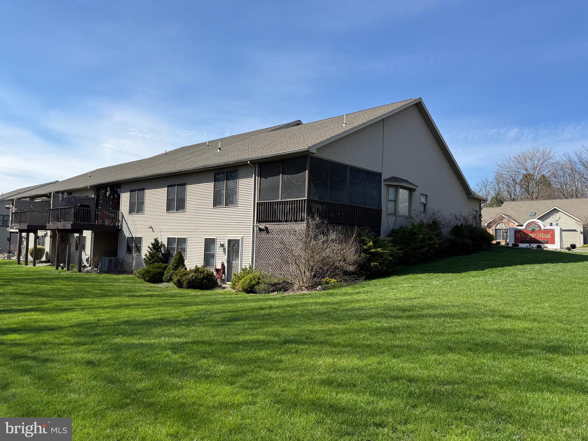 6401 WHISPER WOOD LANE