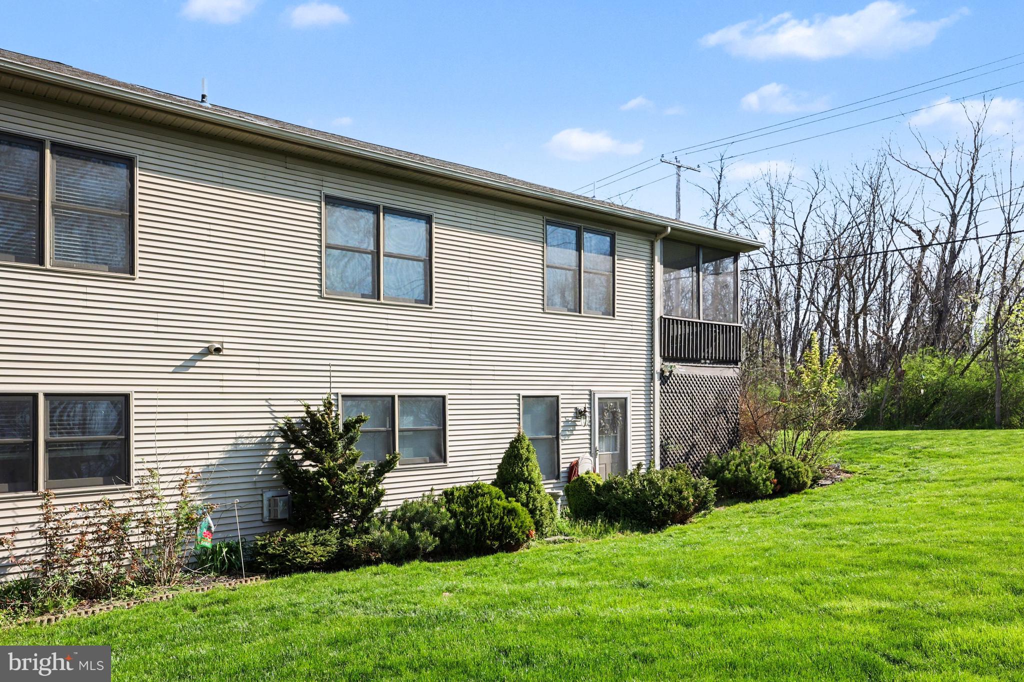 6401 WHISPER WOOD LANE