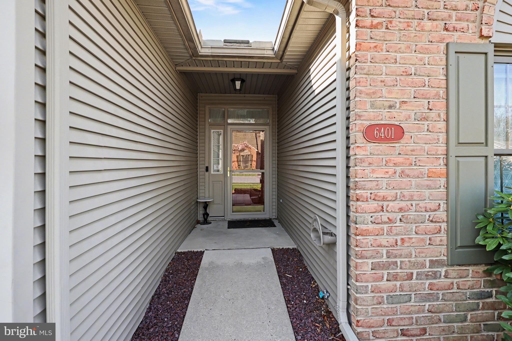 6401 WHISPER WOOD LANE