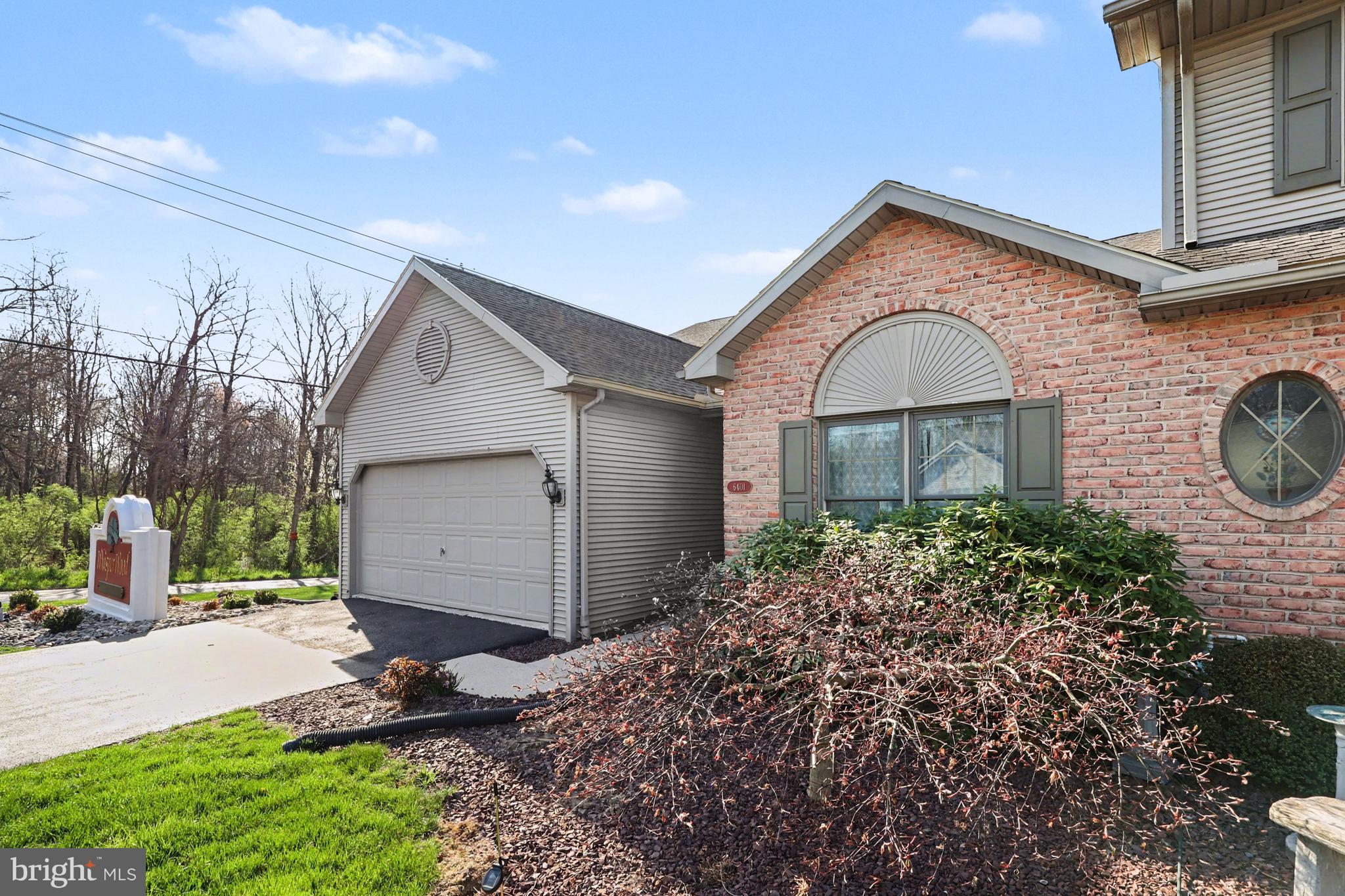 6401 WHISPER WOOD LANE