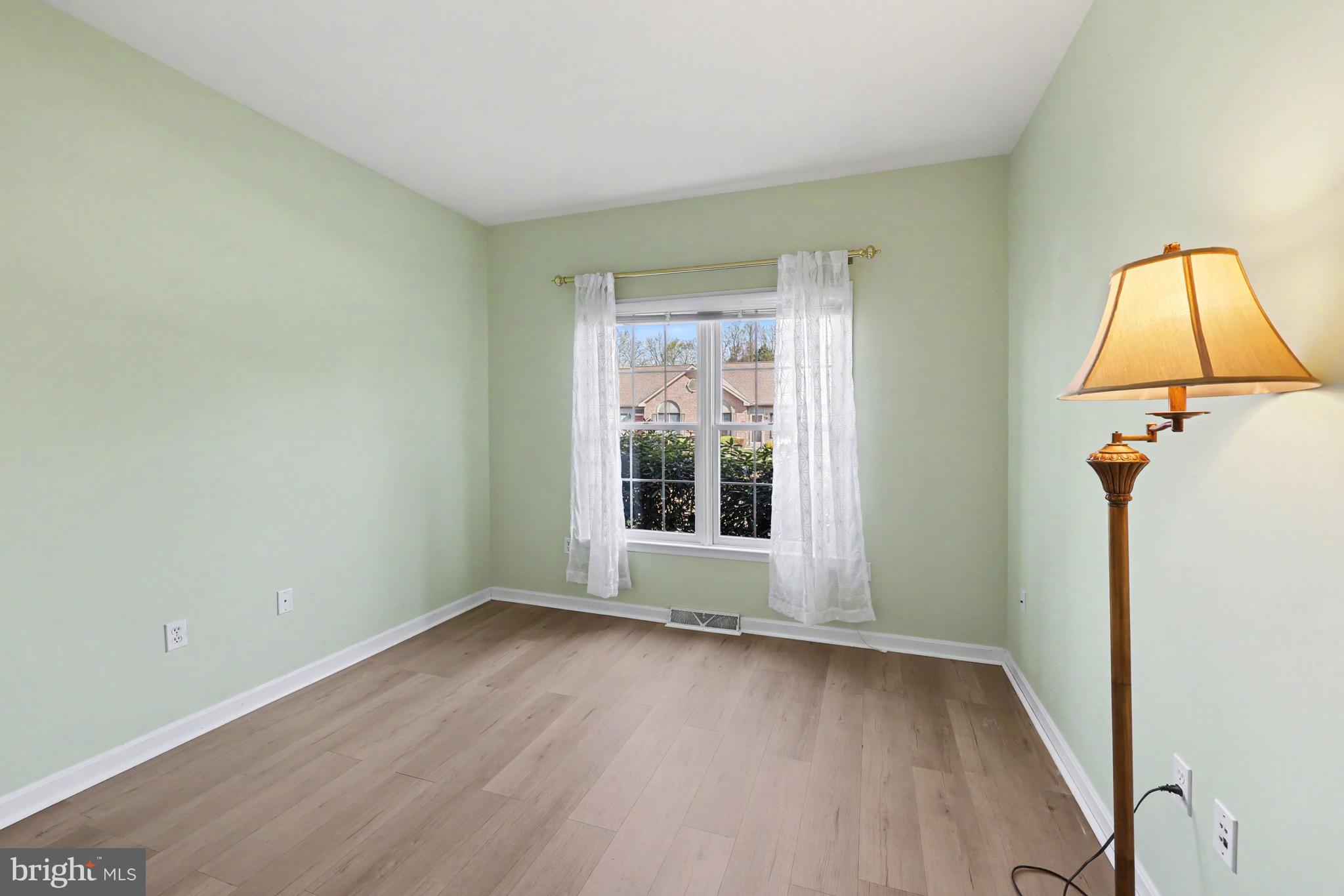 6401 WHISPER WOOD LANE