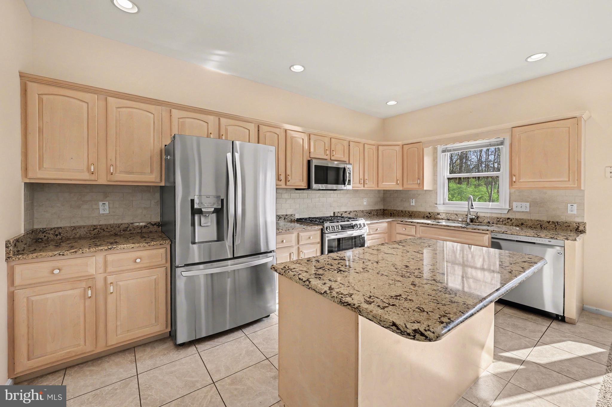 6401 WHISPER WOOD LANE