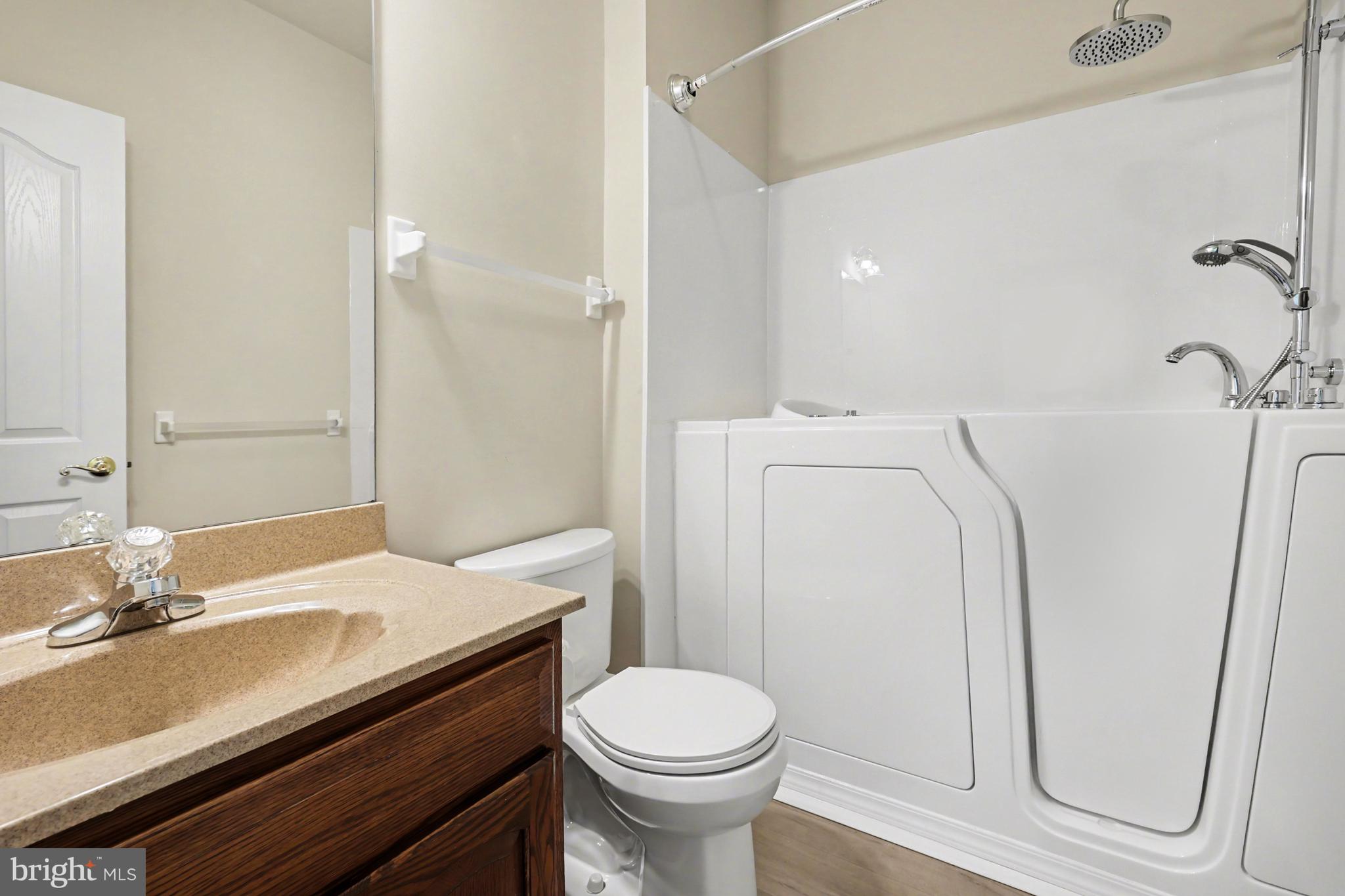 6401 WHISPER WOOD LANE