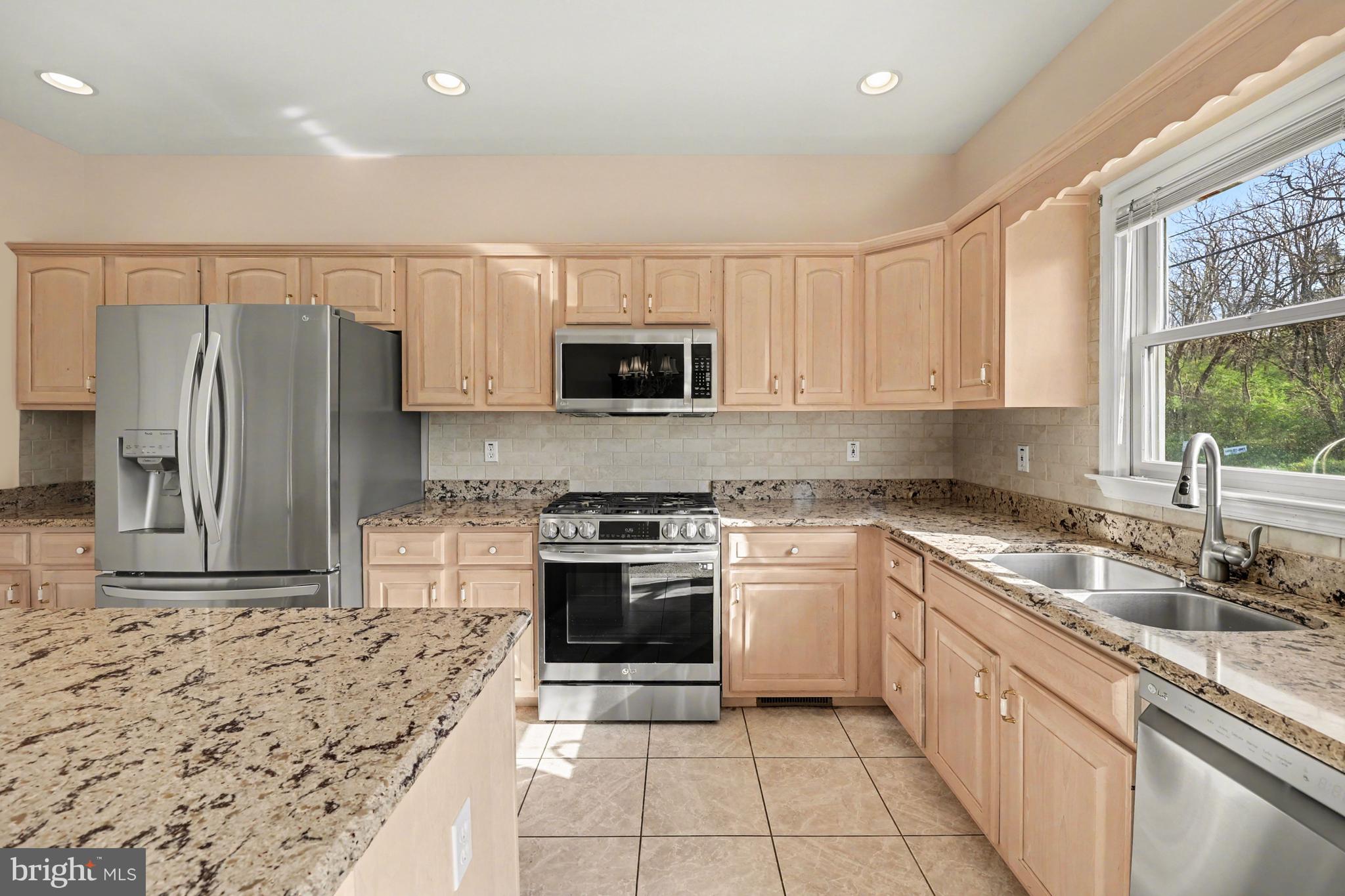 6401 WHISPER WOOD LANE