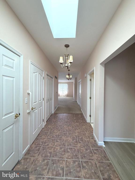 6401 WHISPER WOOD LANE