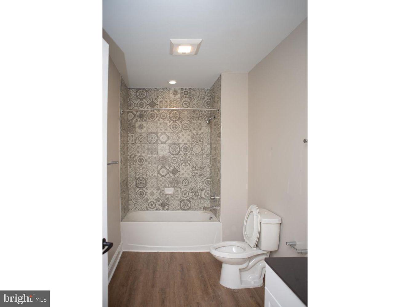 216 W 9TH ST #203