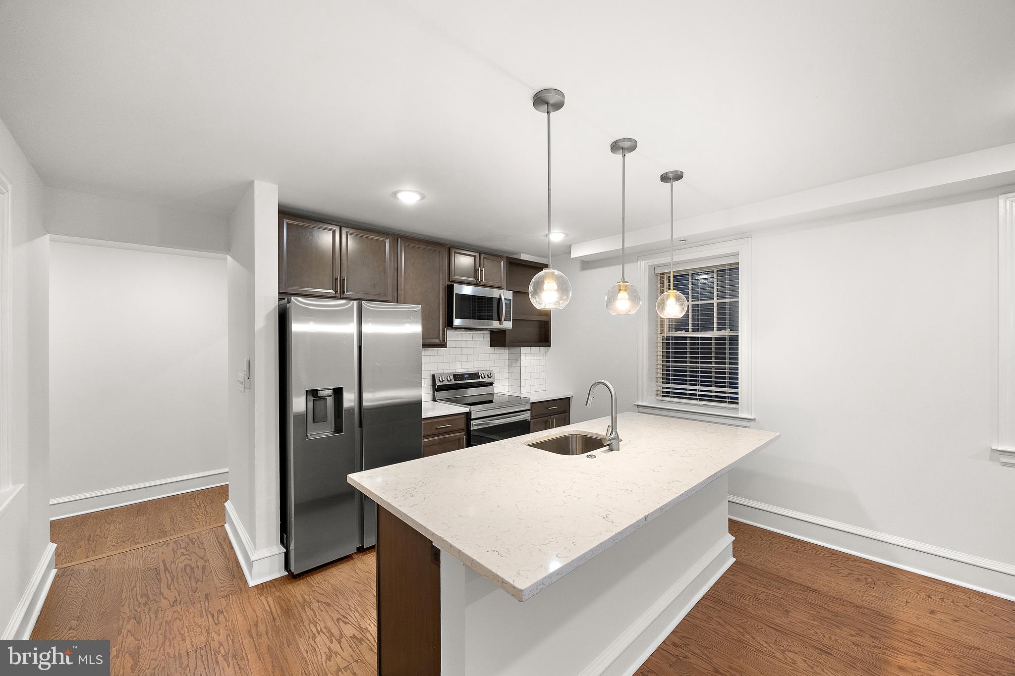 212 W 9TH ST #201