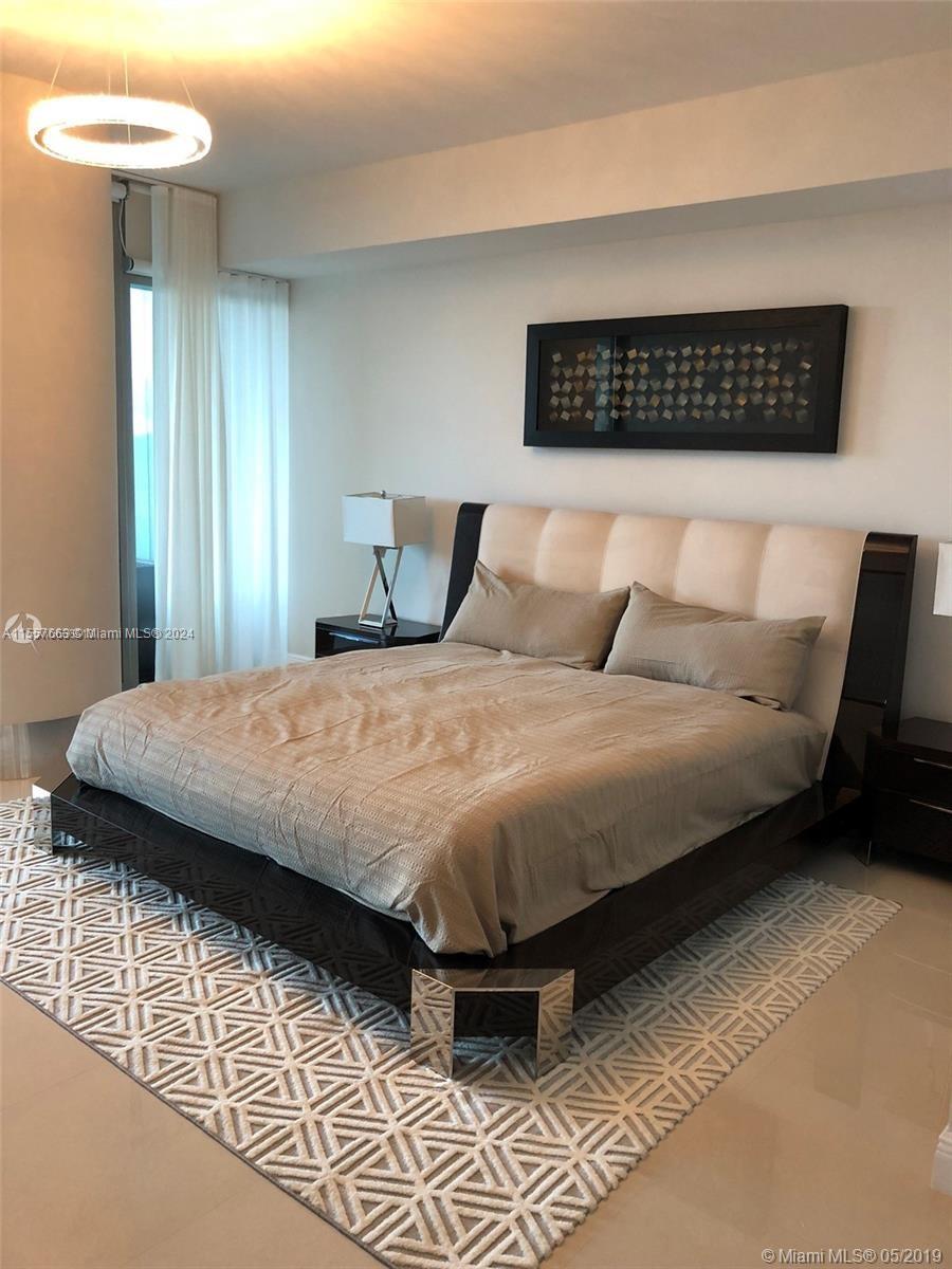 10203 Collins Ave # 605