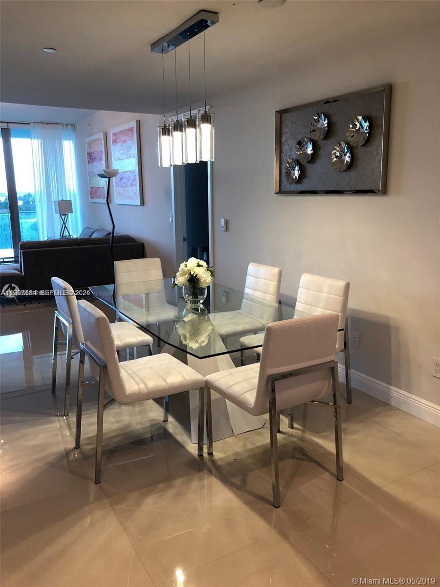 10203 Collins Ave # 605