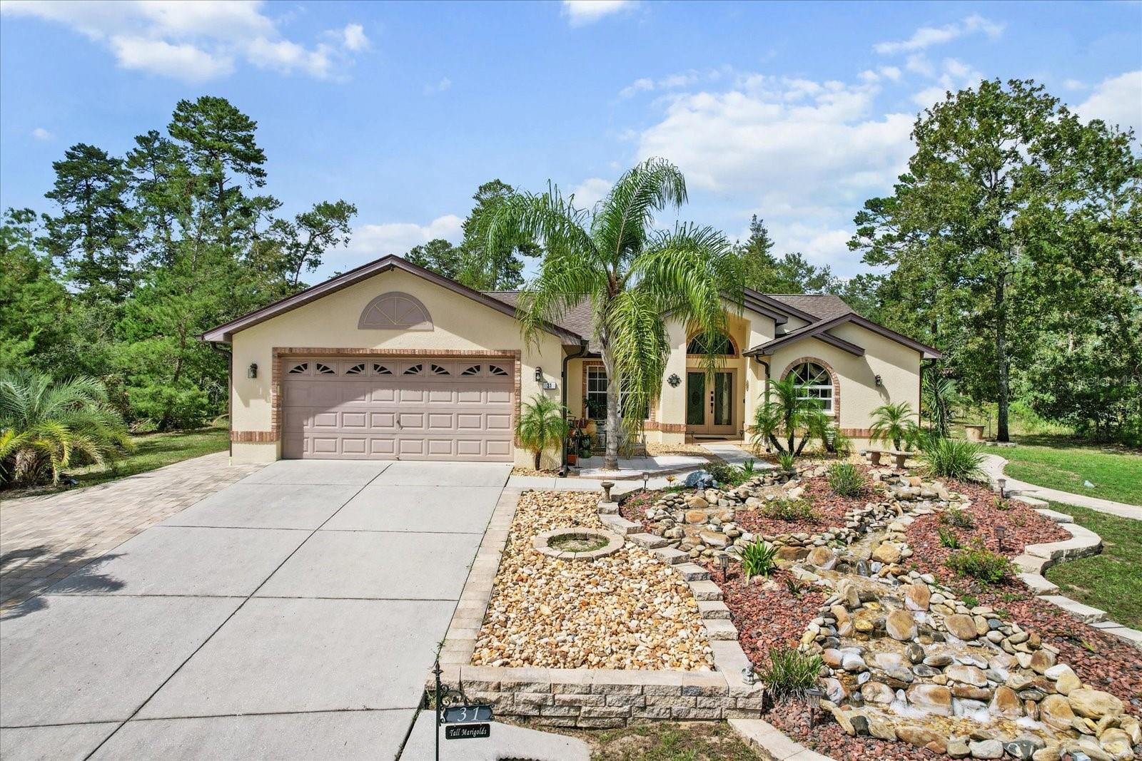 31 TALL MARIGOLDS COURT