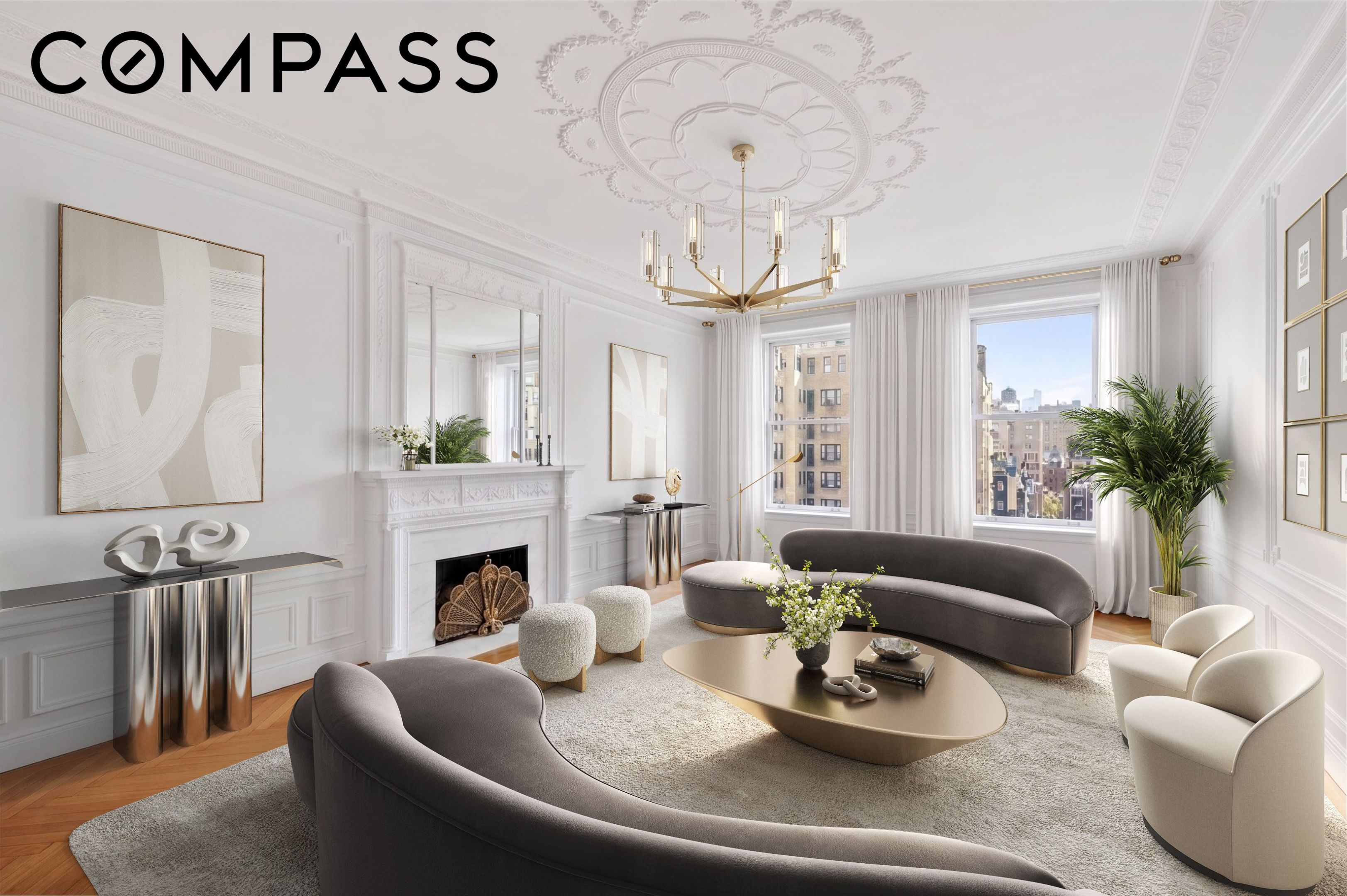Staged living room with ornate moldings, a fireplace, curved sofa, and city views through large windows.