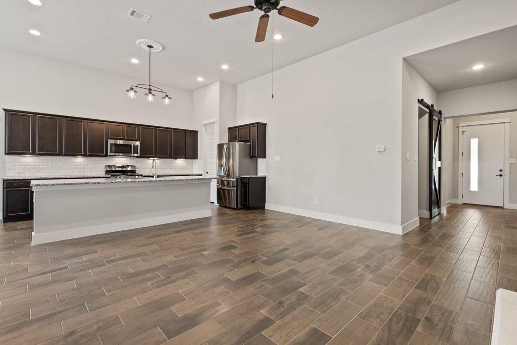 13701 Ronald W Reagan BLVD # 99