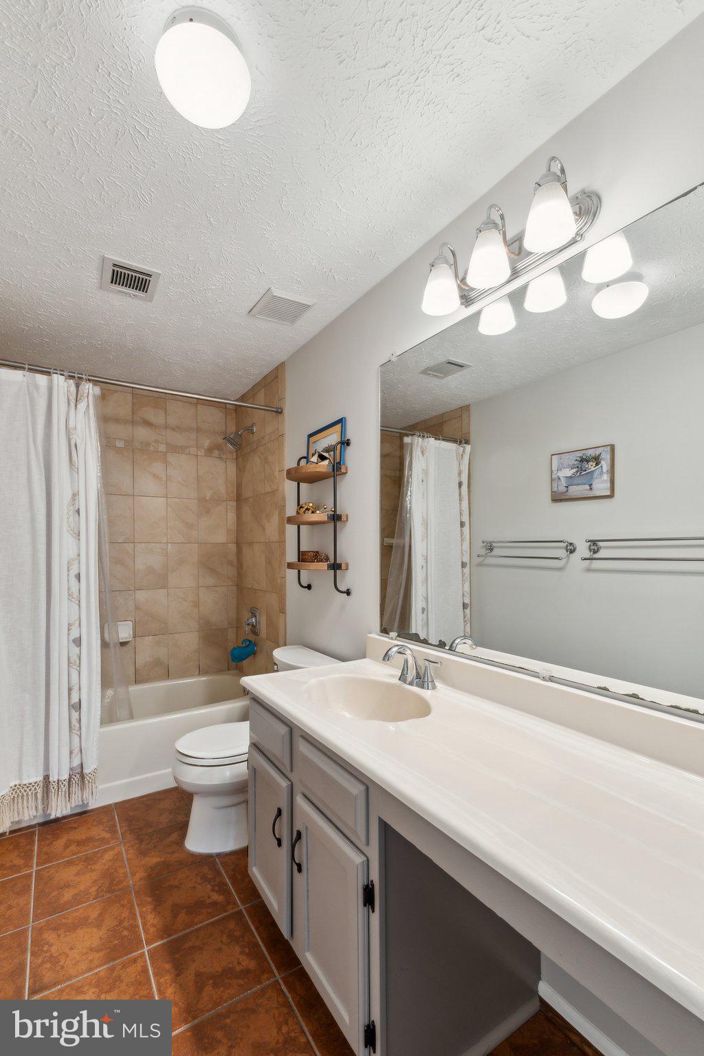 15184 HOLLEYSIDE DRIVE