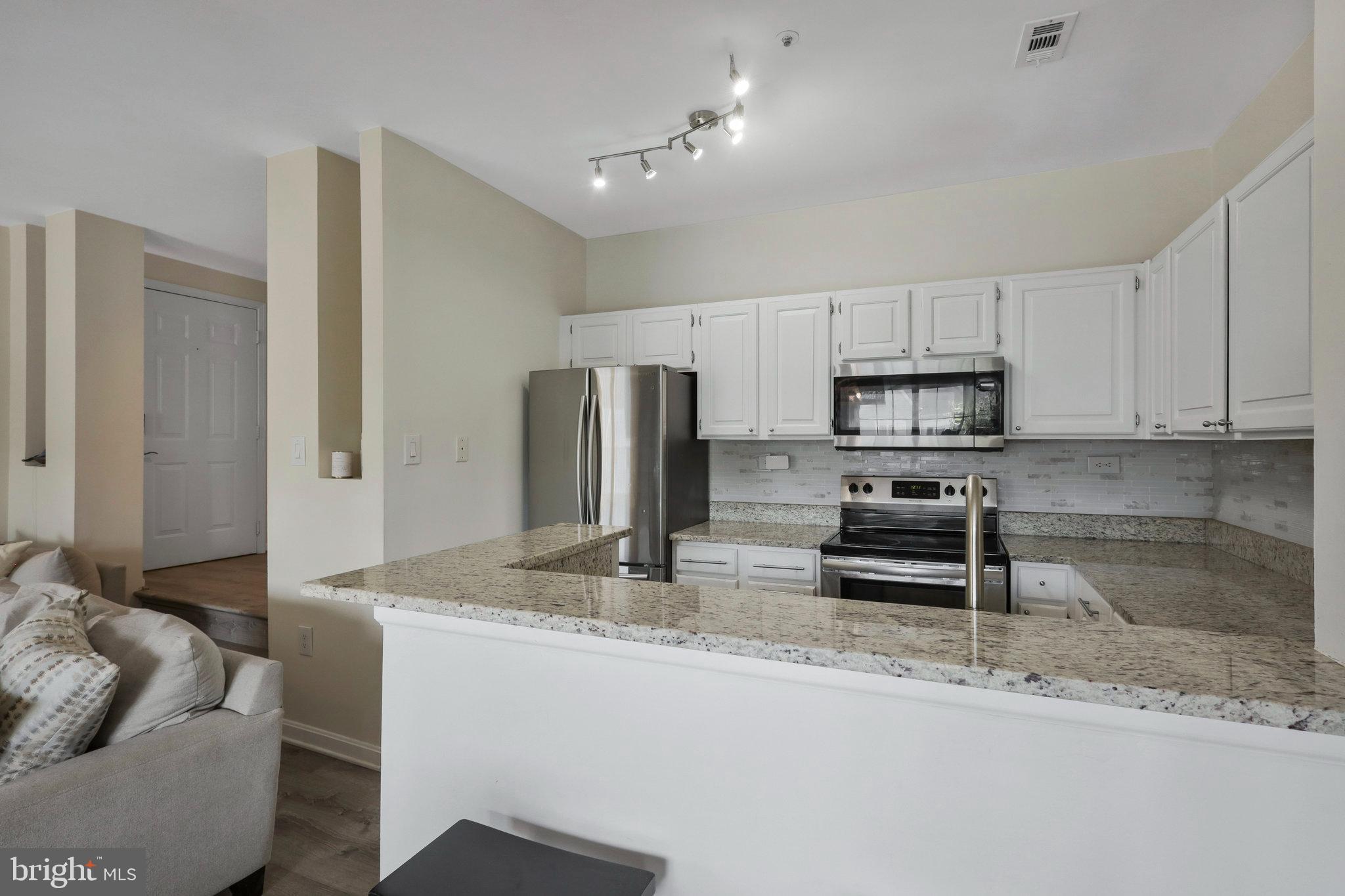 271 S PICKETT ST #302