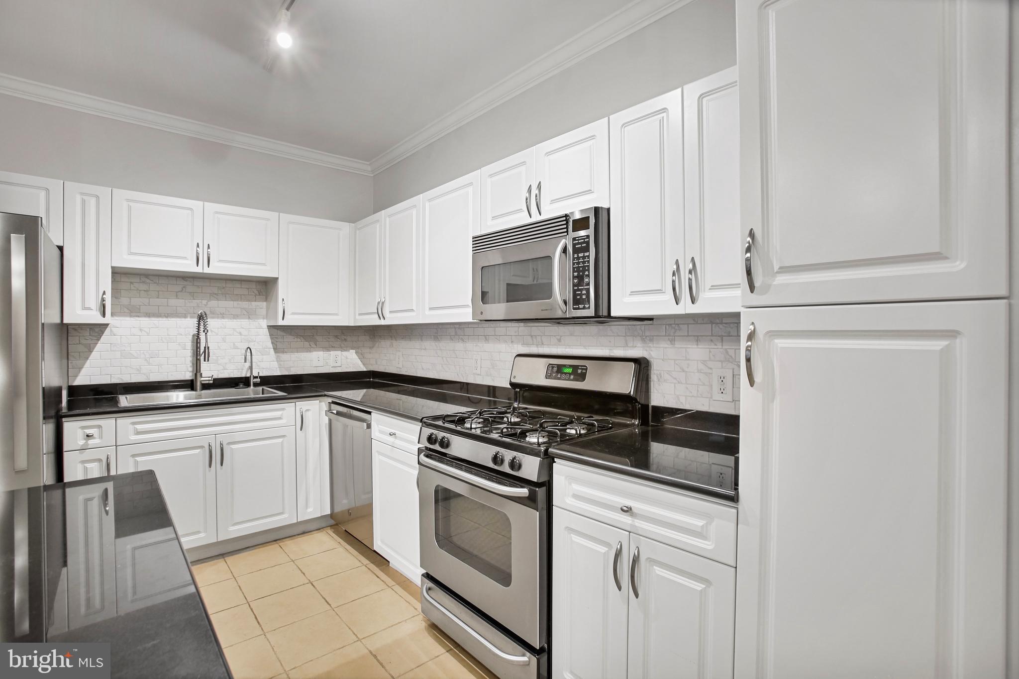 12937 CENTRE PARK CIR #203