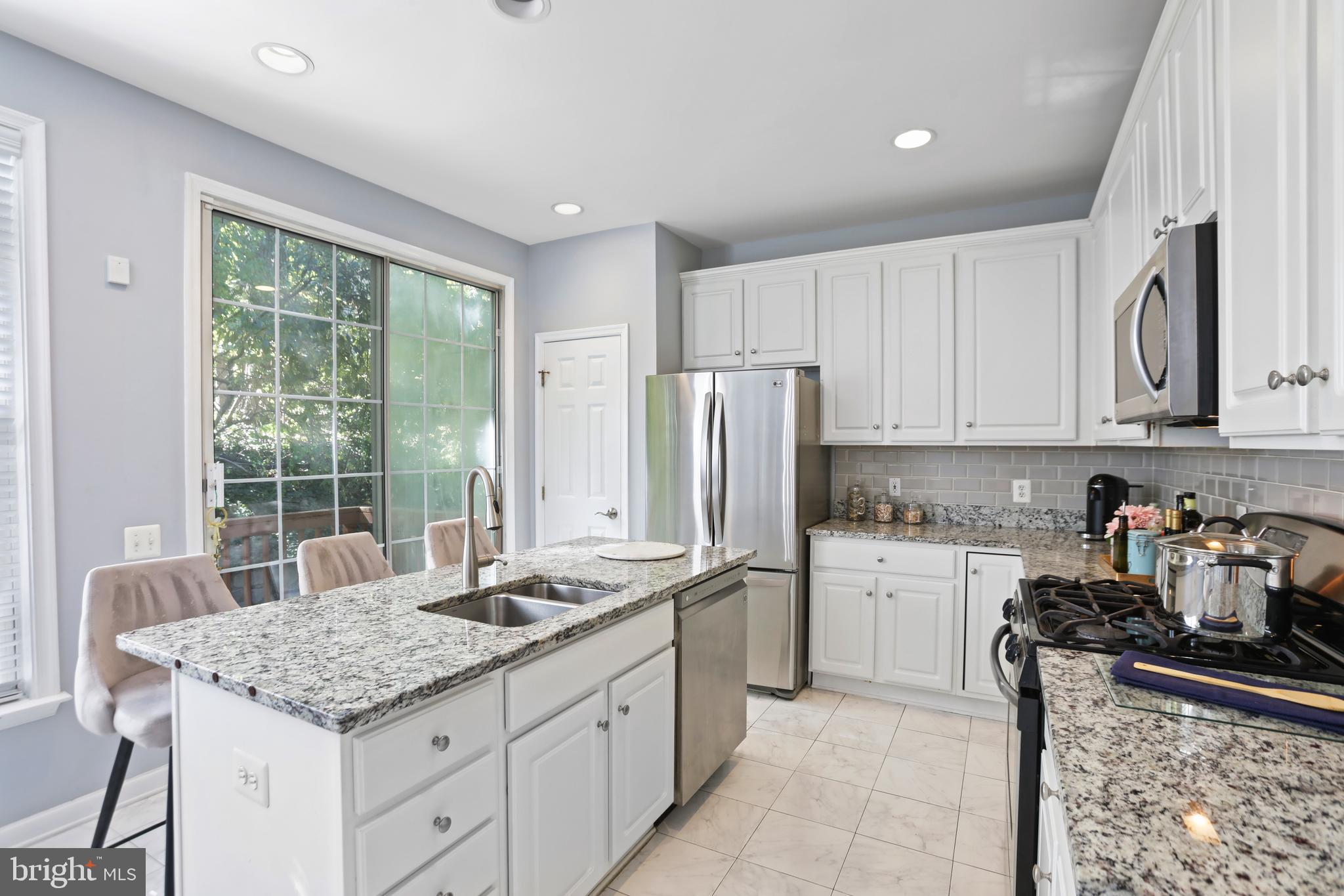 7725 HERITAGE WOODS WAY