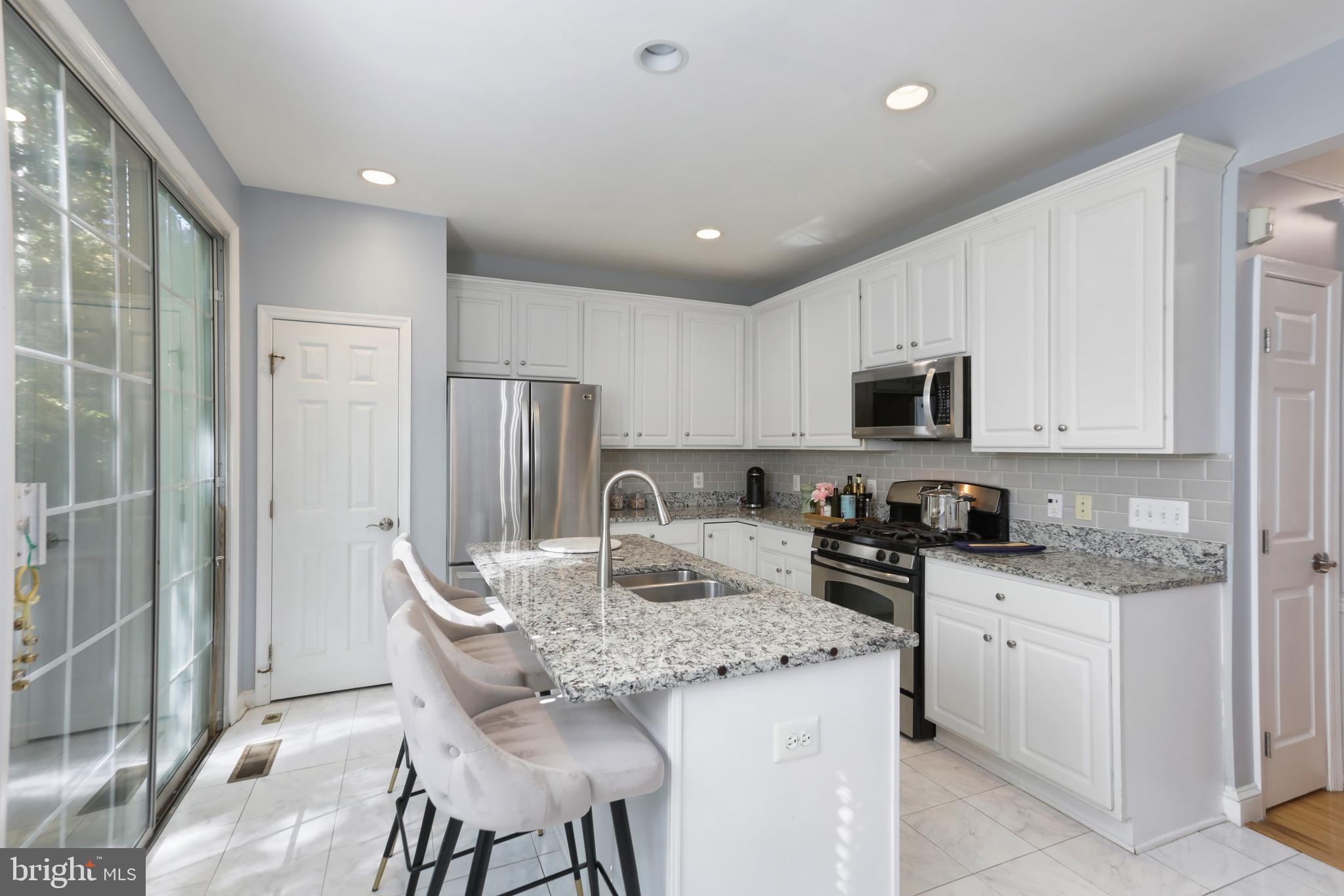 7725 HERITAGE WOODS WAY