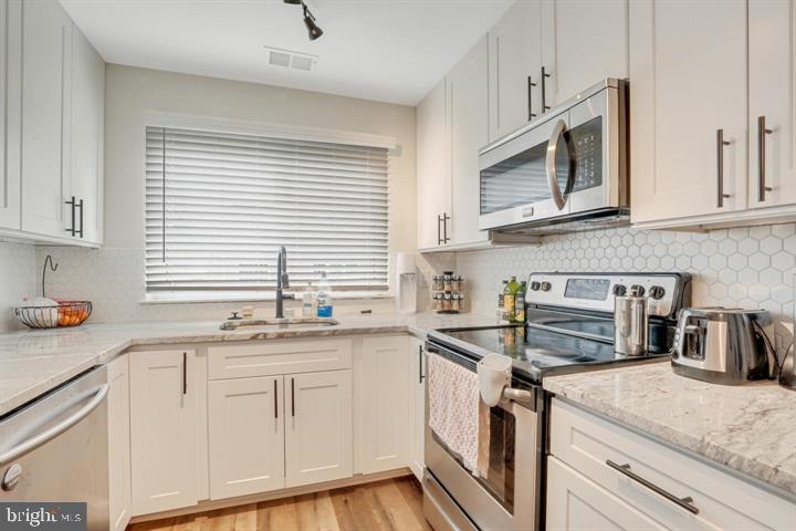 1121 Huntmaster TERRACE NE Unit: 301