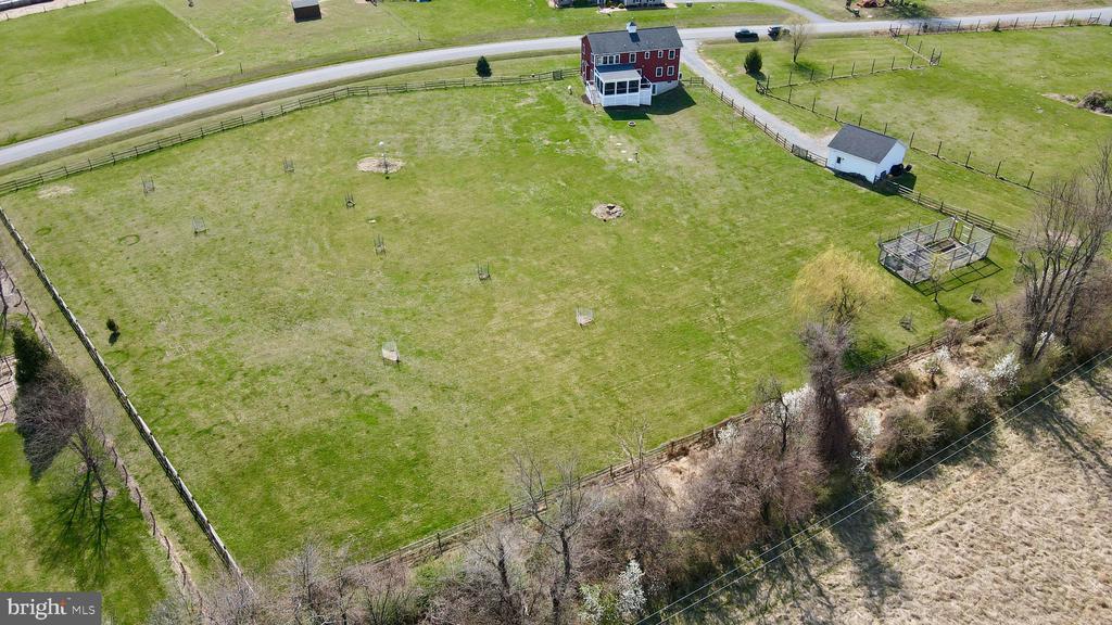 15615 WHISPERING KNOLL COURT