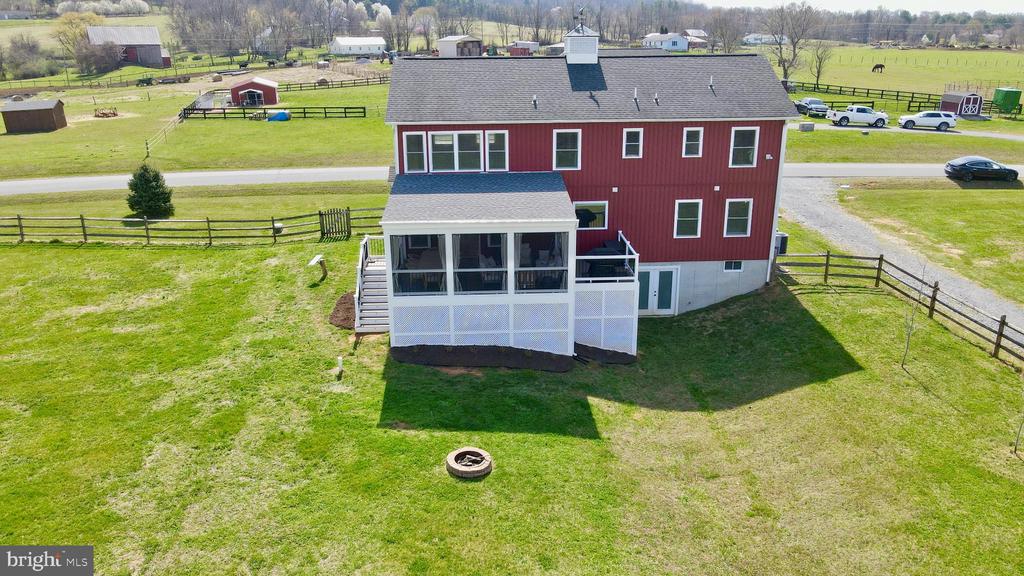 15615 WHISPERING KNOLL COURT
