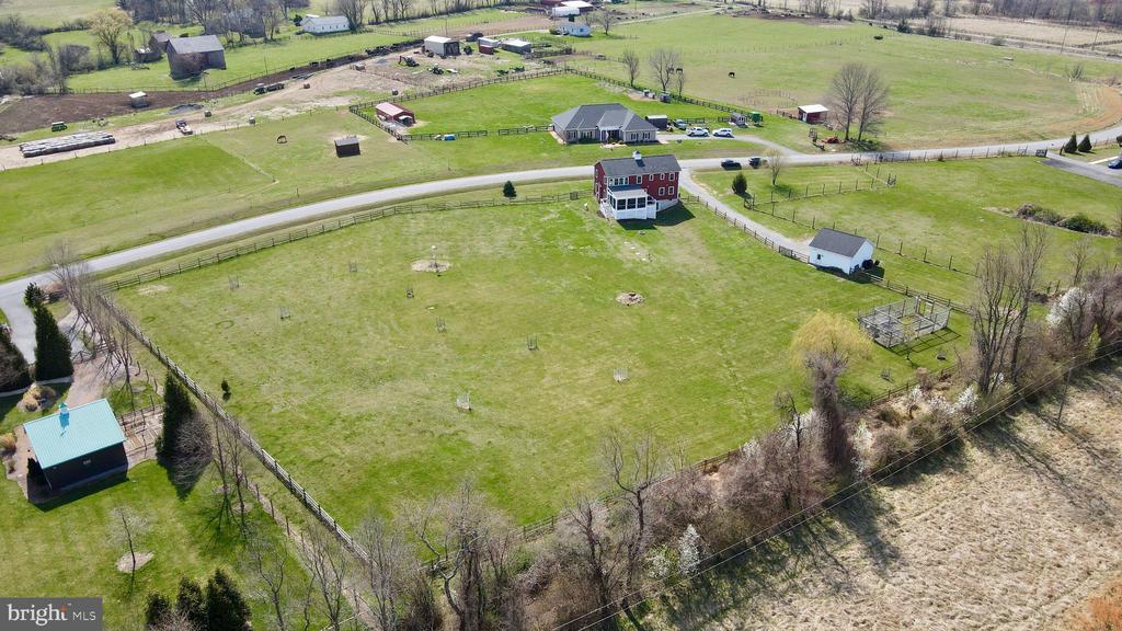 15615 WHISPERING KNOLL COURT