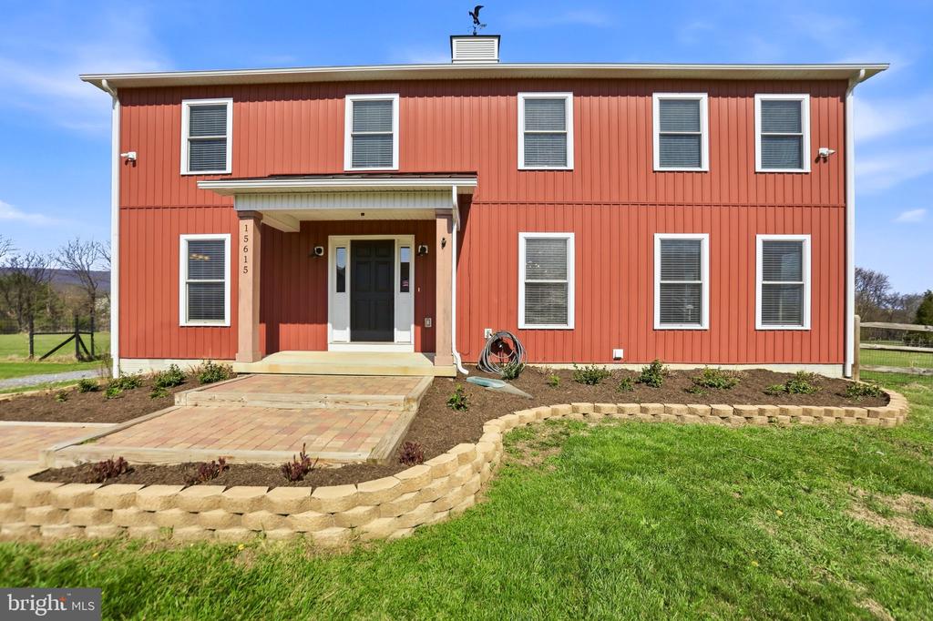 15615 WHISPERING KNOLL COURT