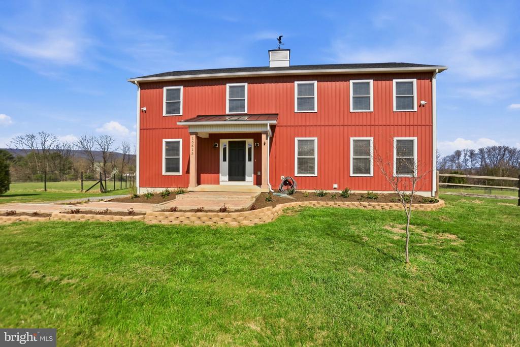 15615 WHISPERING KNOLL COURT