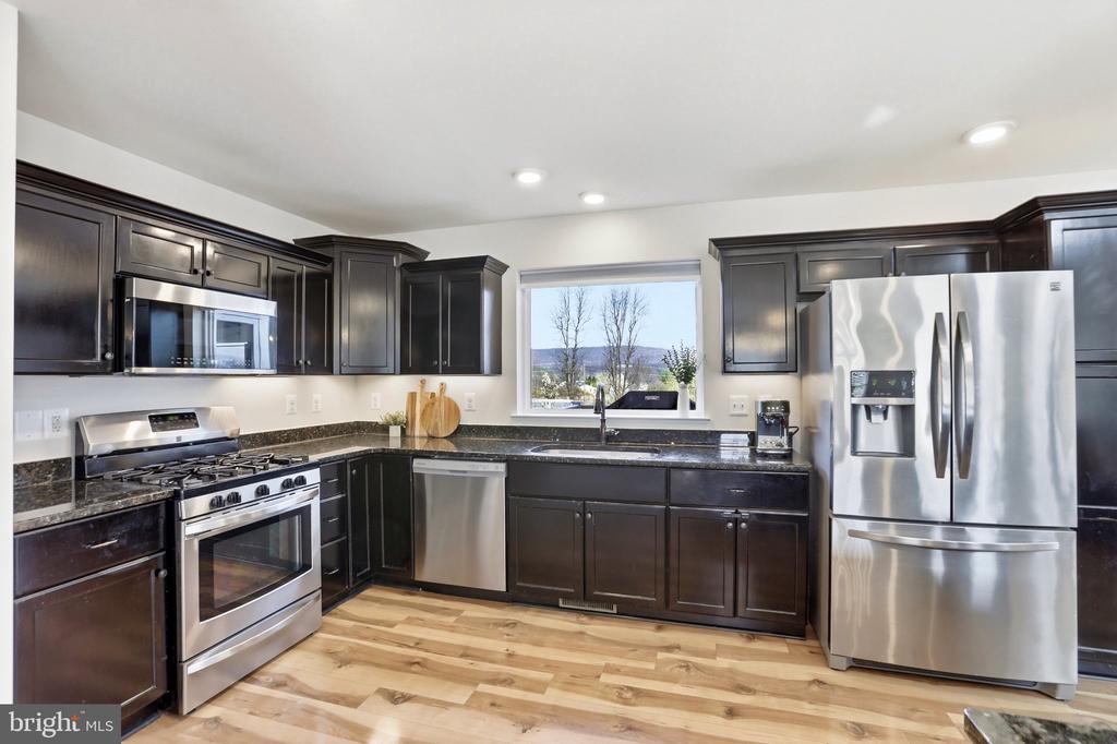 15615 WHISPERING KNOLL COURT