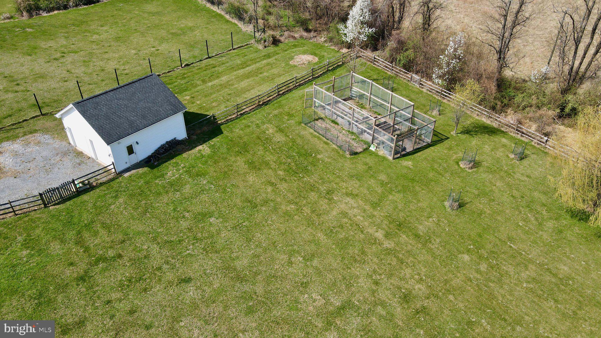 15615 WHISPERING KNOLL COURT