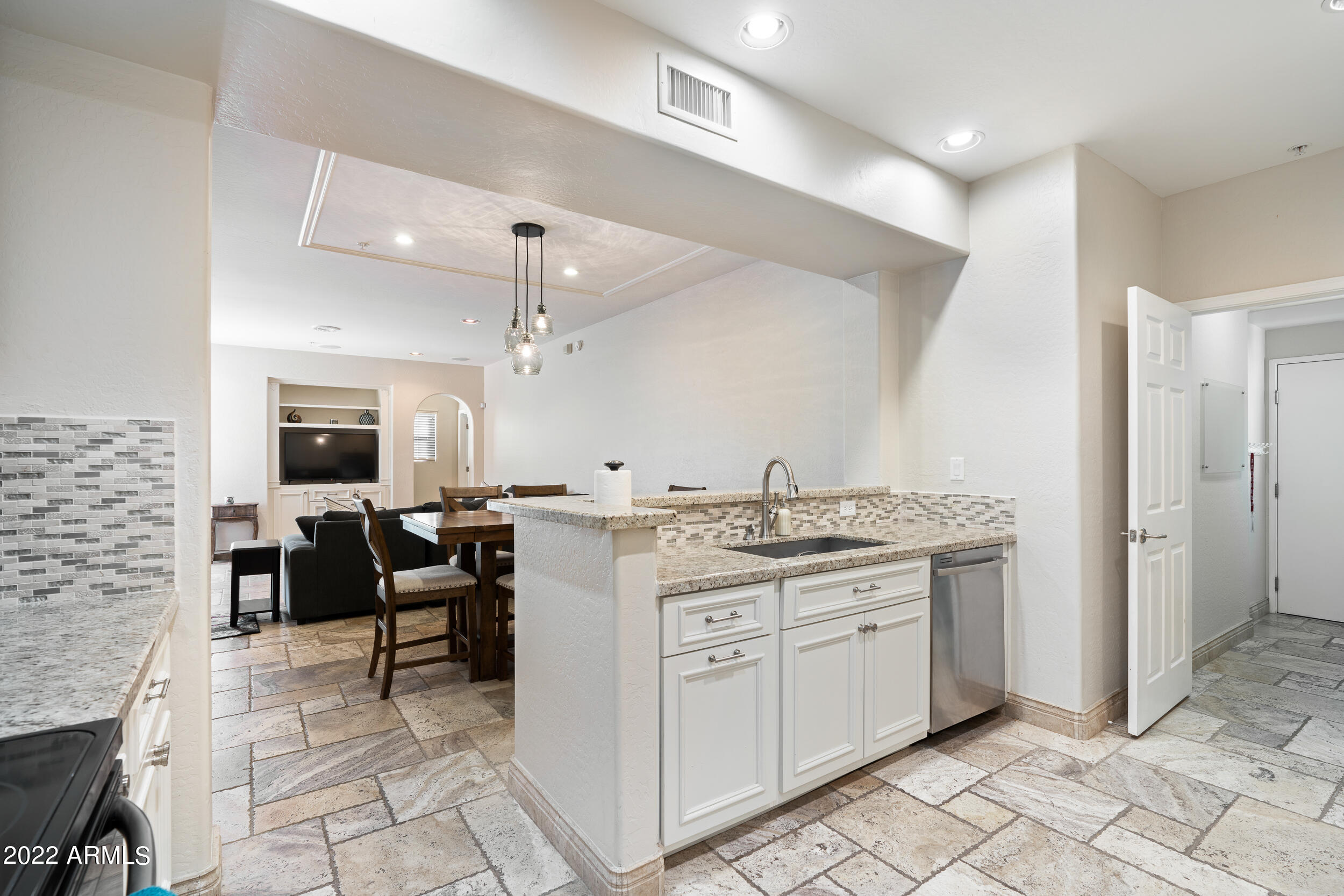 3935 E ROUGH RIDER Road, 1206