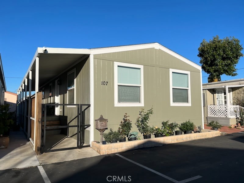 7560 Woodman Place 107