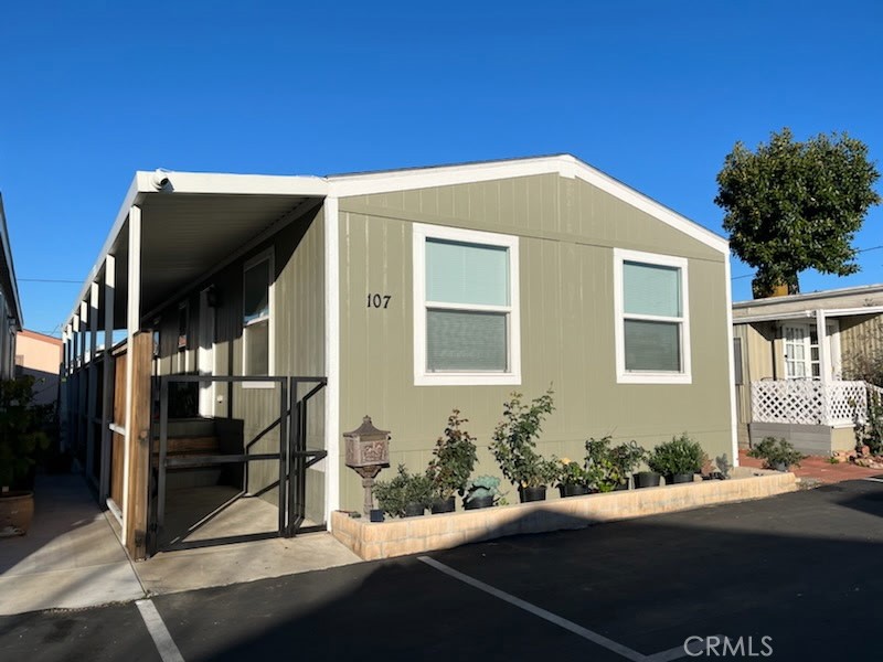 7560 Woodman Place 107