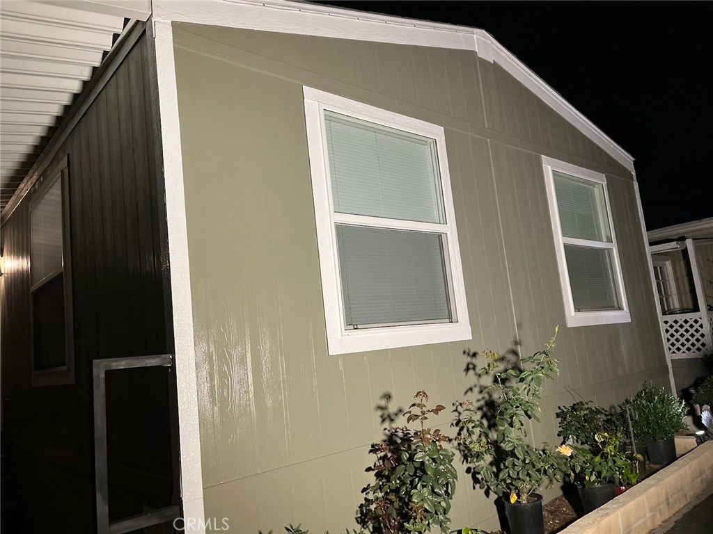 7560 Woodman Place 107