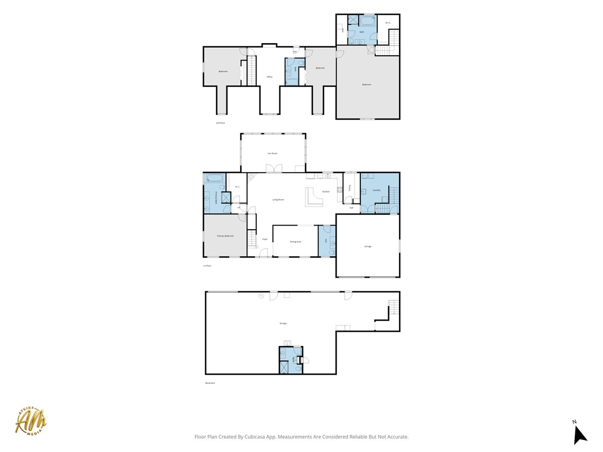 Three-level floor plan showing the first floor, second floor, and basement.
