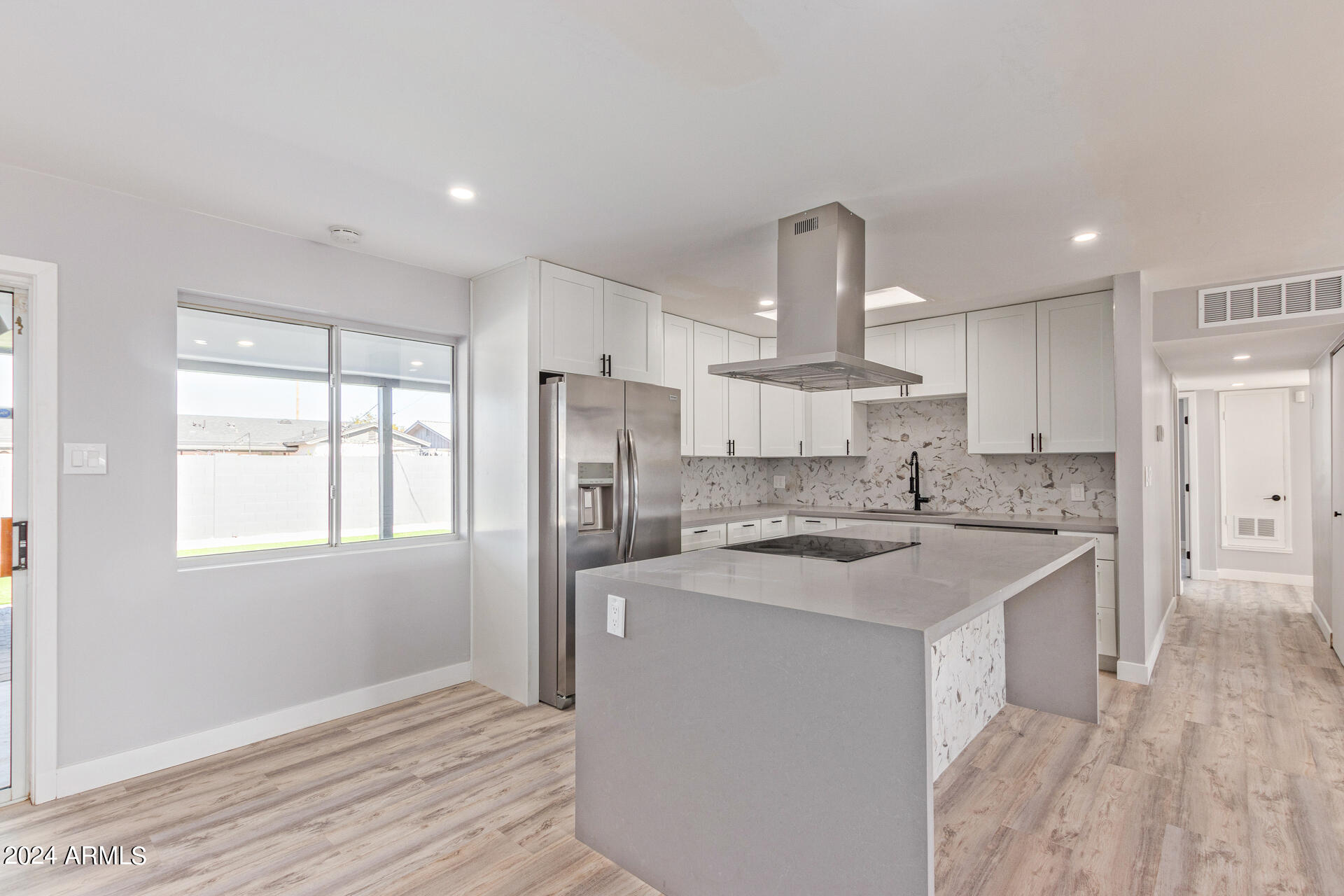 7008 E LATHAM Street