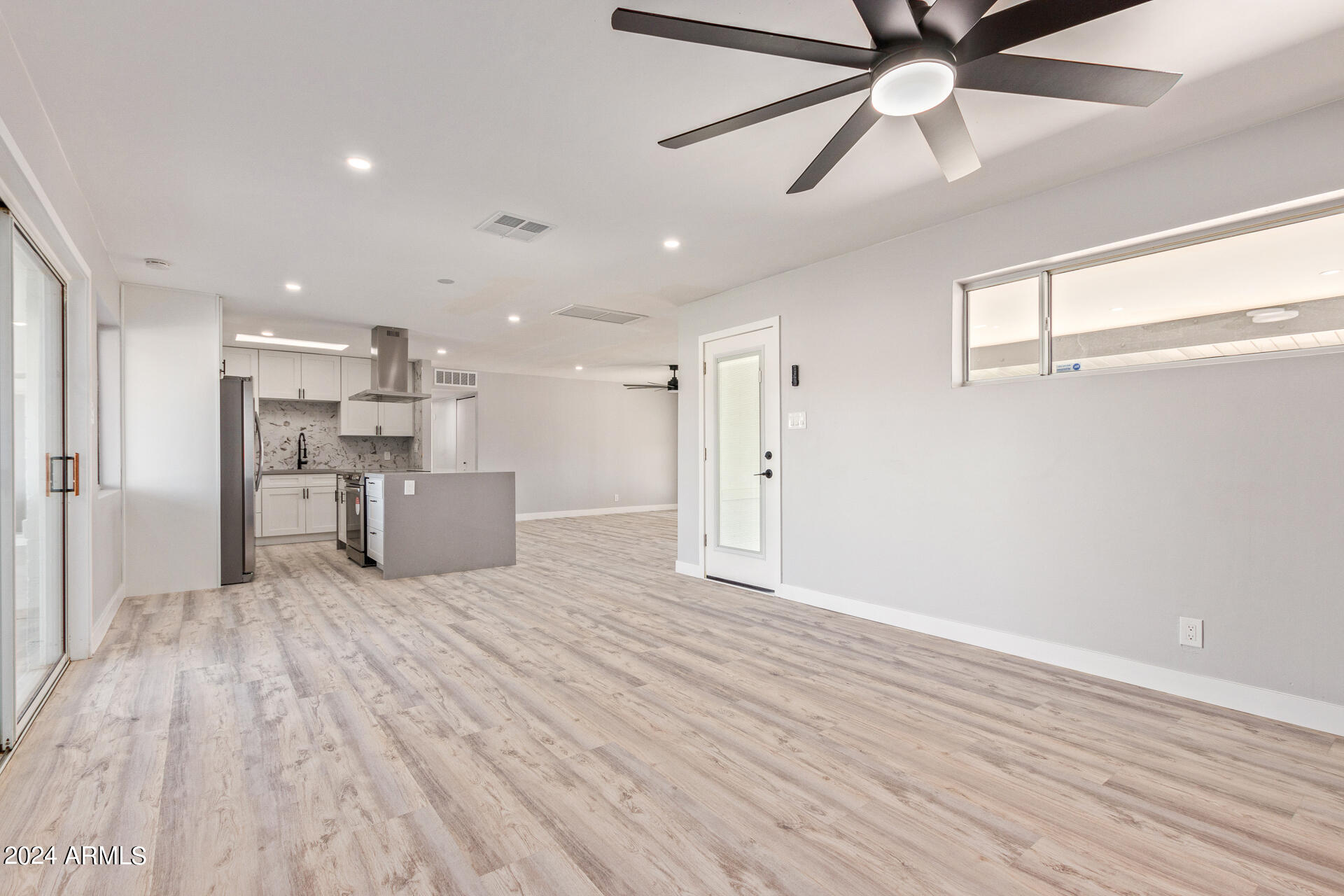 7008 E LATHAM Street