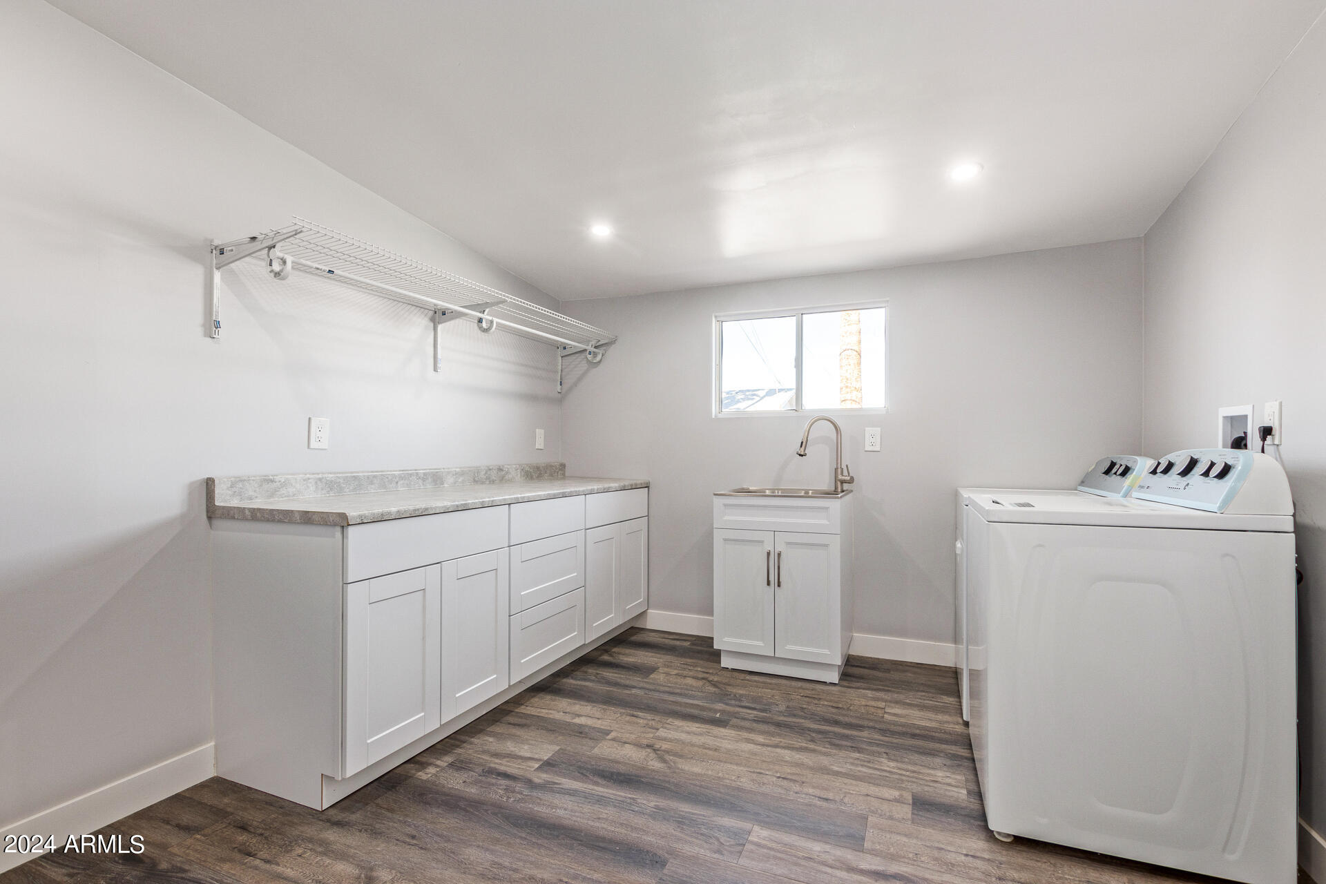 7008 E LATHAM Street