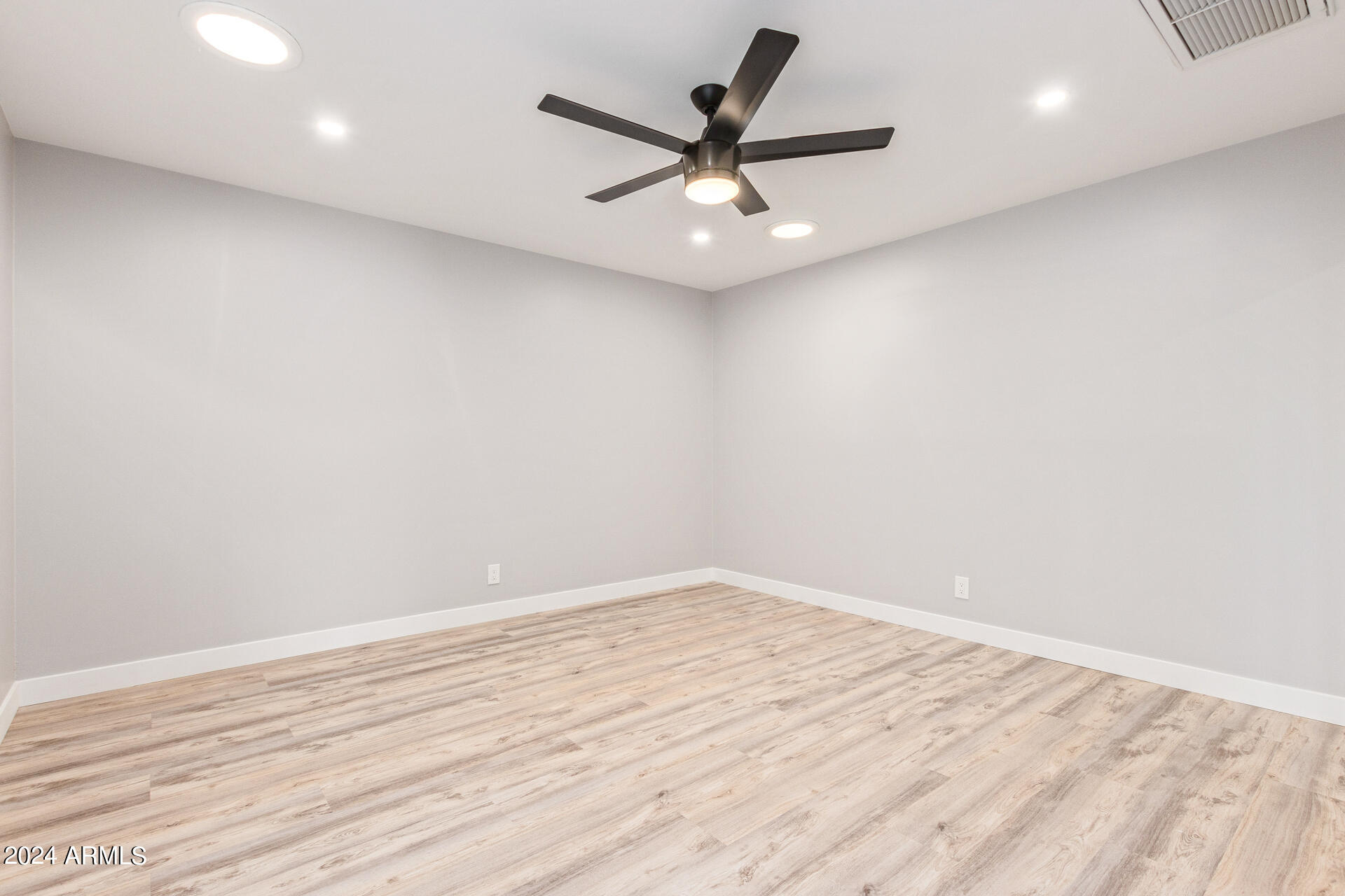 7008 E LATHAM Street