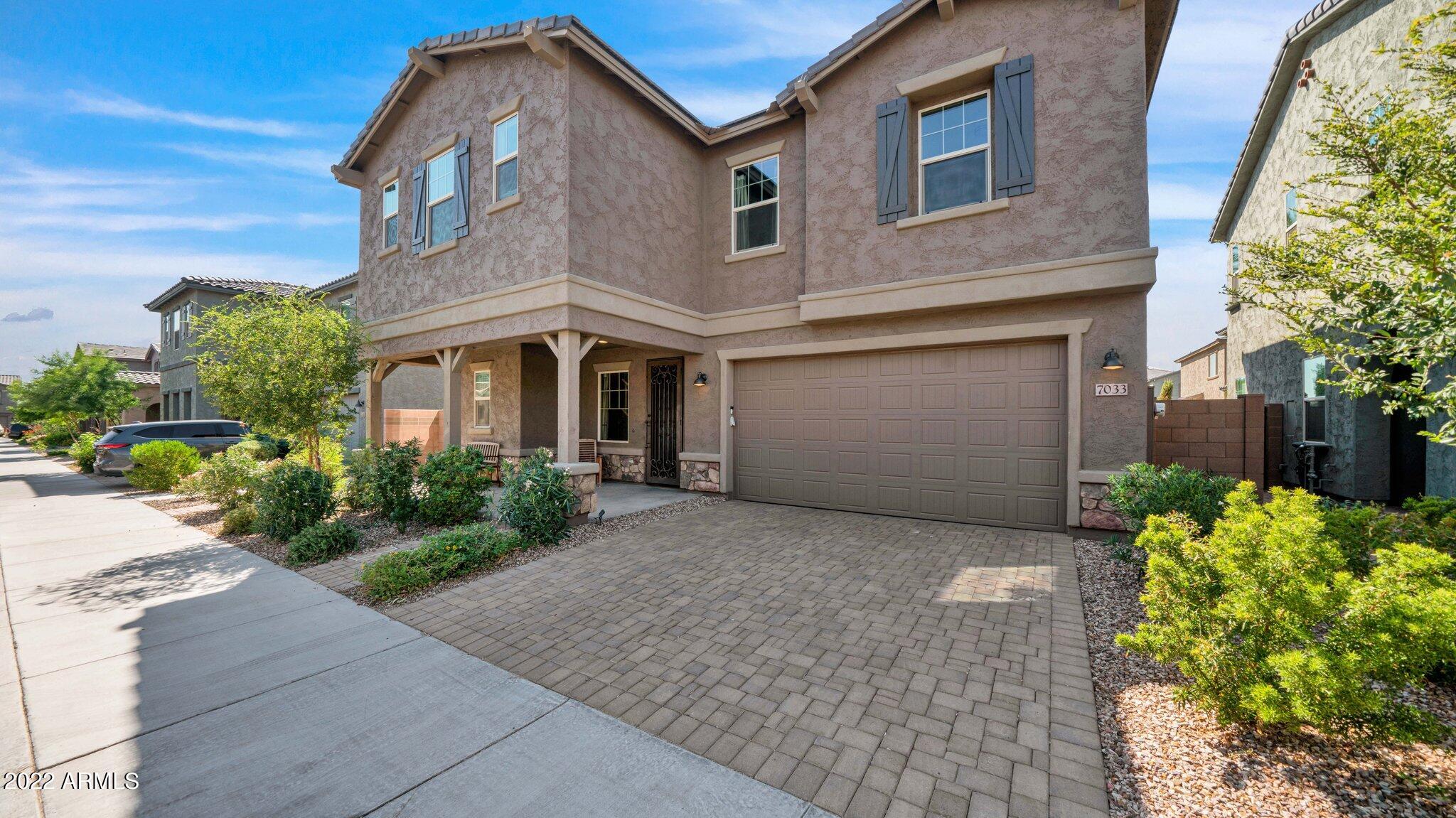 7033 E DIAMOND Street