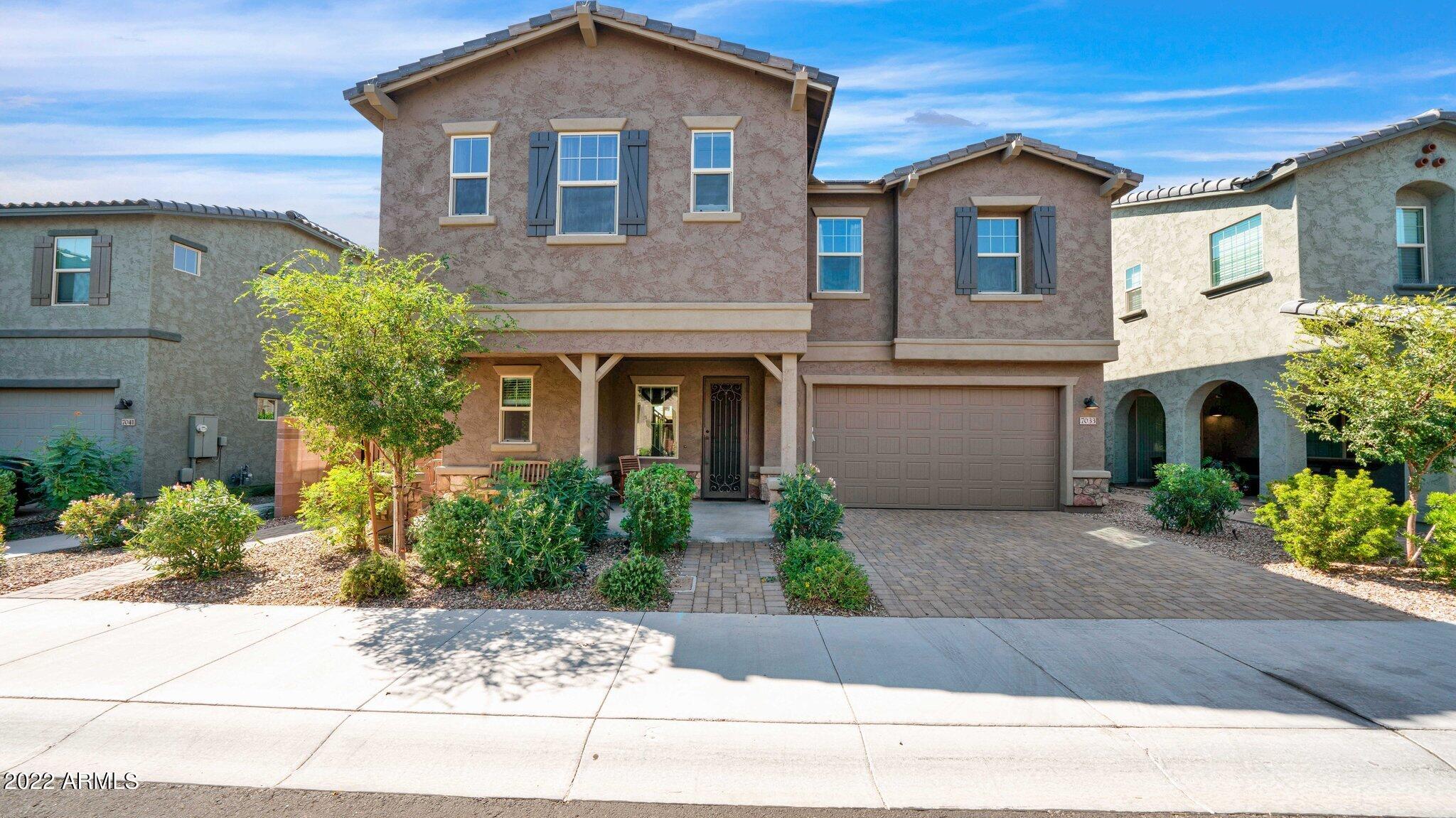 7033 E DIAMOND Street