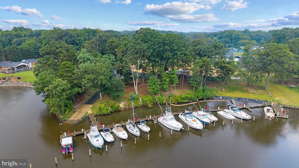 RARE BACK CREEK WATERFRONT NEW CONSTRUCTION + 26 SLIP MARINA| 7962 FRANCES LANE