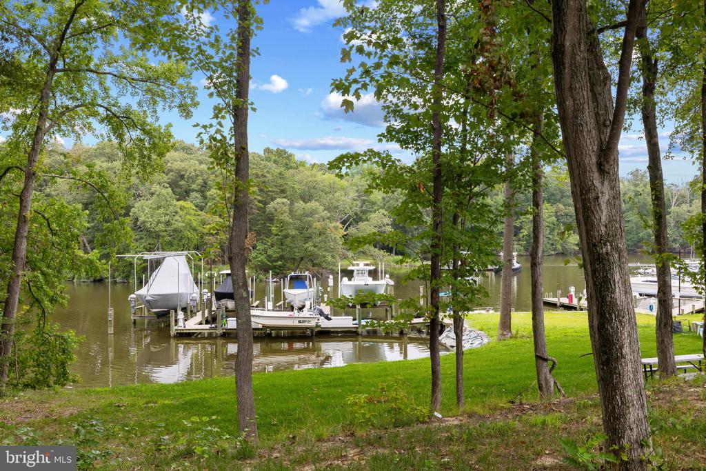 RARE BACK CREEK WATERFRONT NEW CONSTRUCTION + 26 SLIP MARINA| 7962 FRANCES LANE