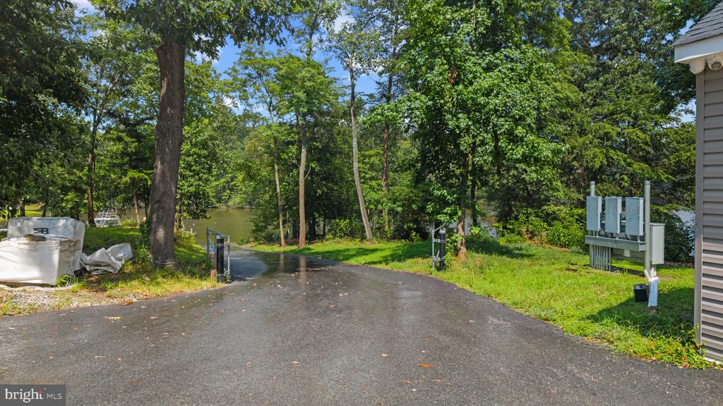 RARE BACK CREEK WATERFRONT NEW CONSTRUCTION + 26 SLIP MARINA| 7962 FRANCES LANE