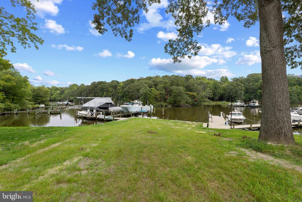 RARE BACK CREEK WATERFRONT NEW CONSTRUCTION + 26 SLIP MARINA| 7962 FRANCES LANE
