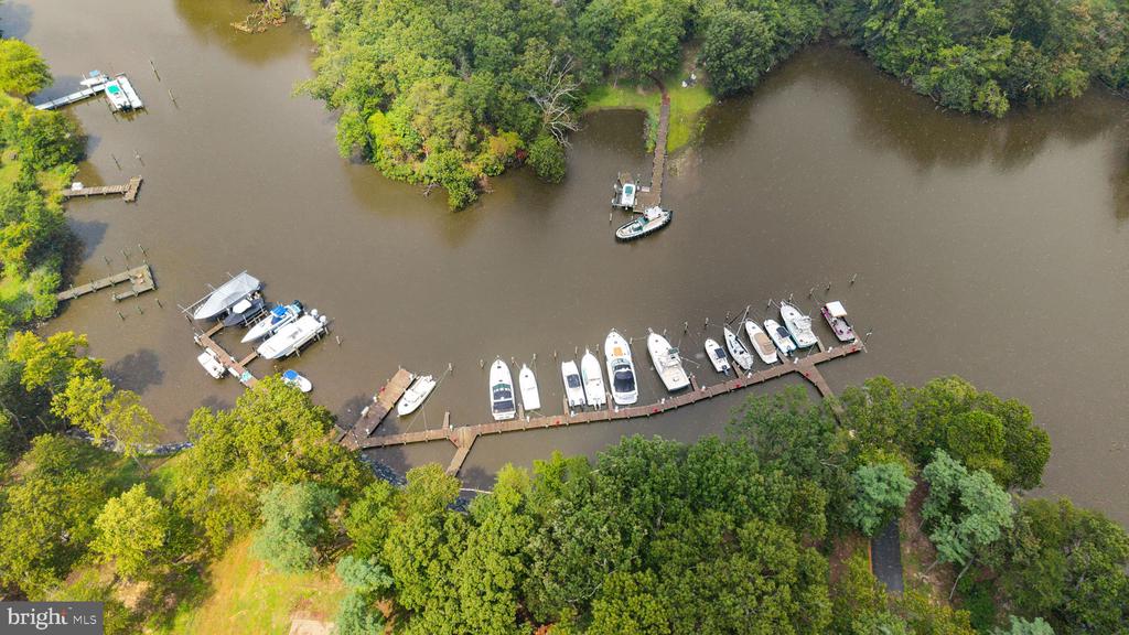 RARE BACK CREEK WATERFRONT NEW CONSTRUCTION + 26 SLIP MARINA| 7962 FRANCES LANE