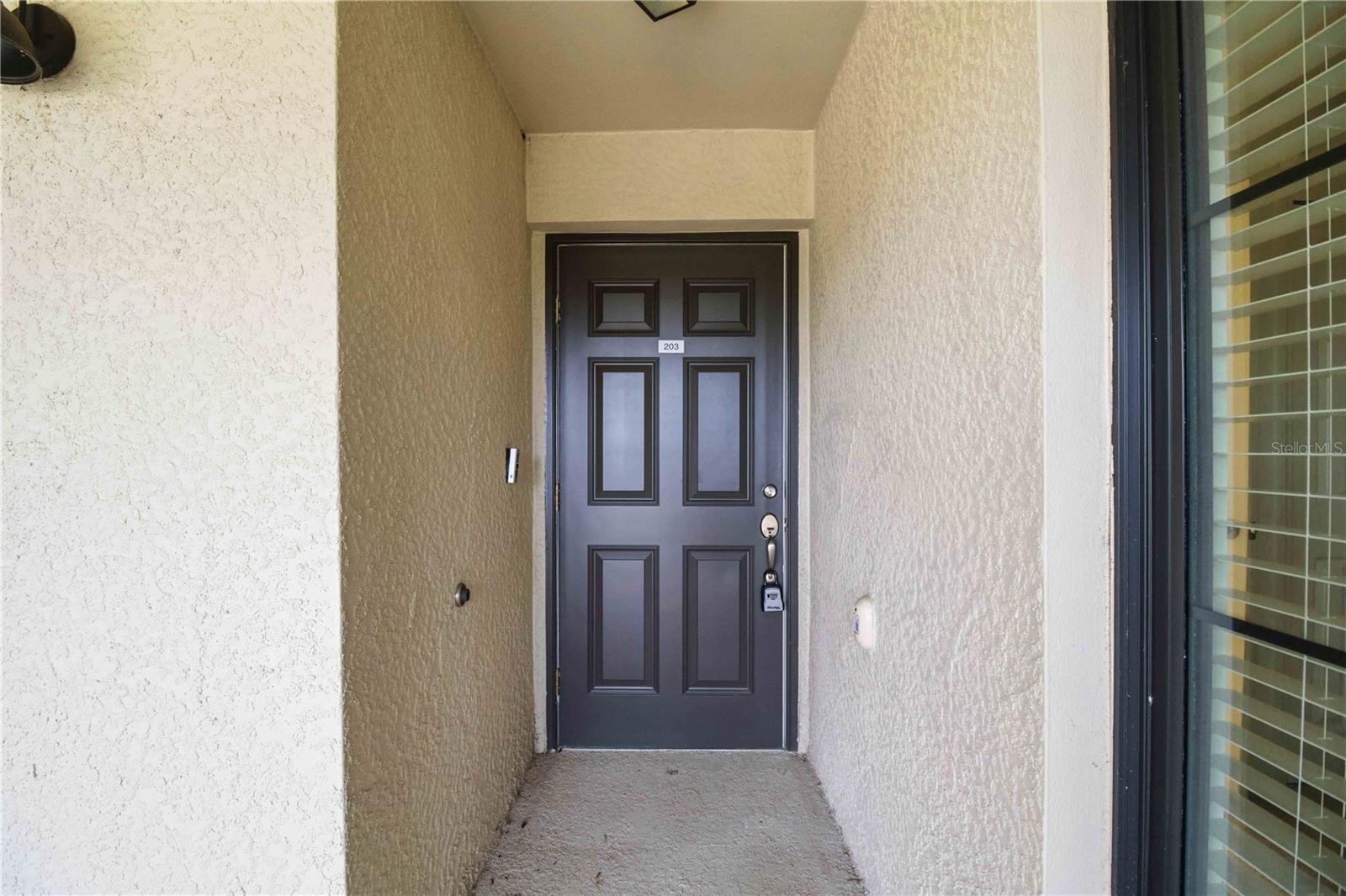 5695 PALMER CIR #203