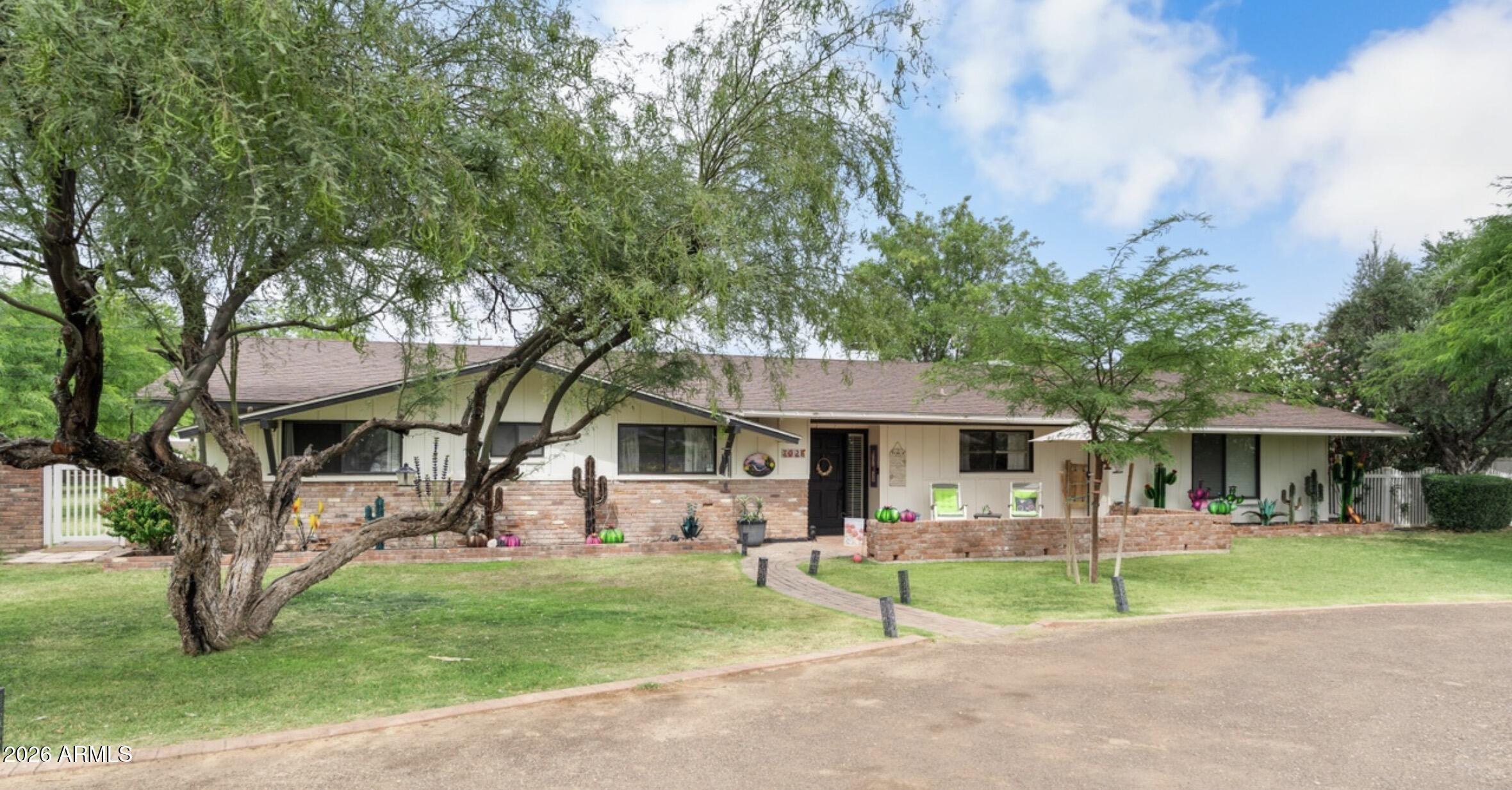 7026 E SUNNYSIDE Drive