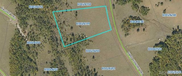 Rural land parcel outlined in turquoise beside Hard Hickory Trail, with trees and open fields.