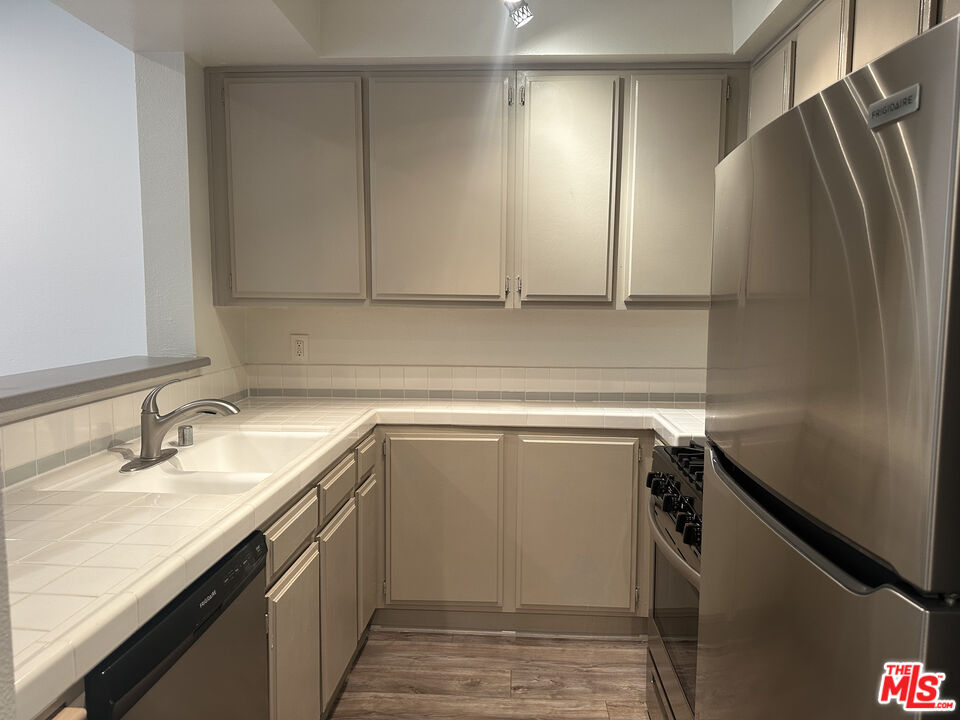 8614 Burton Way Unit: 103